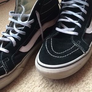 Sk8-Hi black and white high top Vans